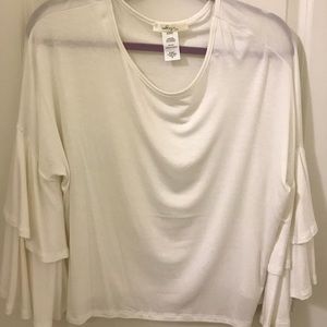 White blouse flirty blouse. NOT FREE PEOPLE!